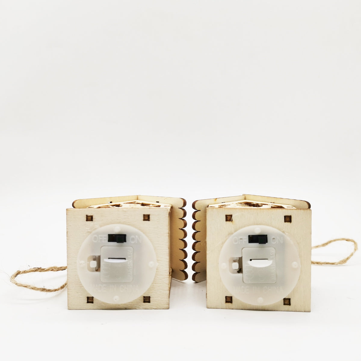 Base of the wooden house with on and off switch for the LED light