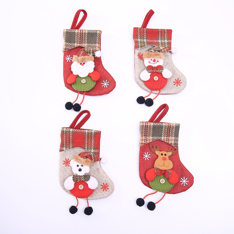 Christmas stocking ornaments in four designs: Santa, Snowman, Bear and Reindeer