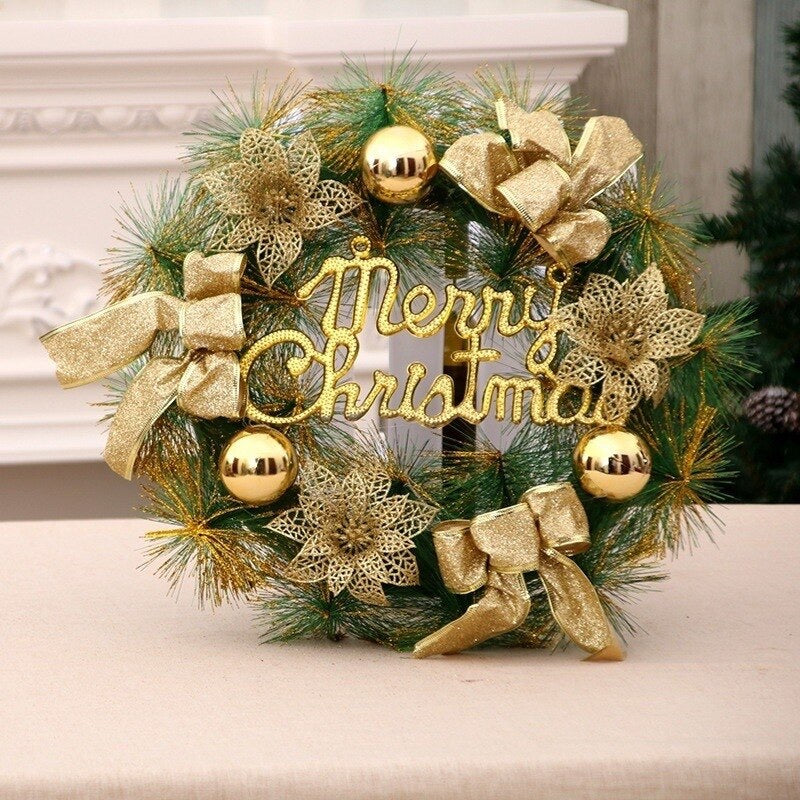 Gold Christmas wreath with baubles, bows and gold lettering